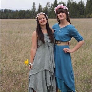 3/4 sleeve, shin length blue dress with buttons.